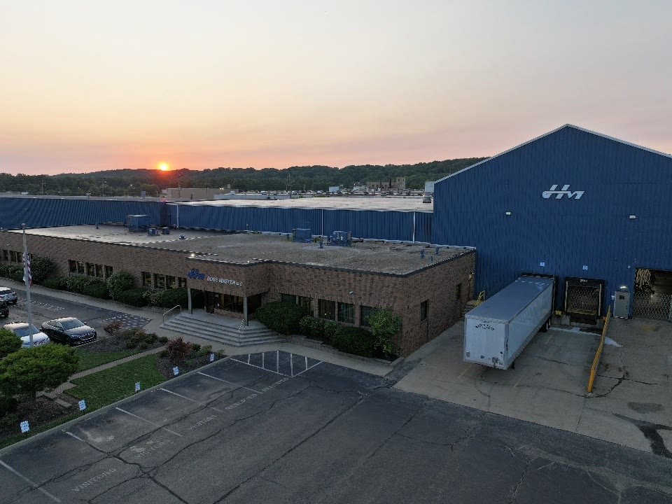 Aerial view of the Hose Master building at sunrise